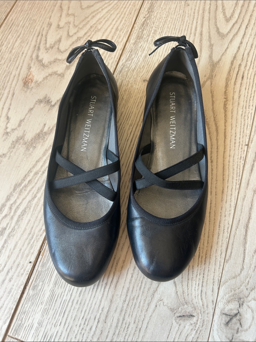 Stuart Weitzman Black Leather Ballet Flats with Crisscross Straps and Ankle Ties